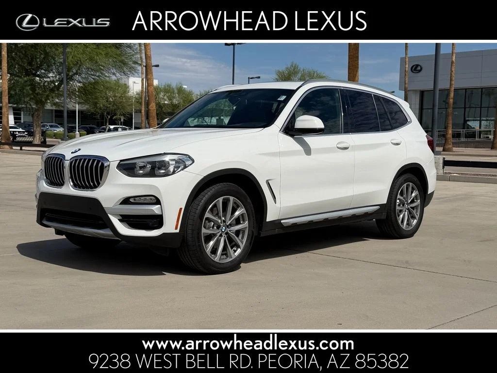 Used 2019 White BMW sDrive30i image 1
