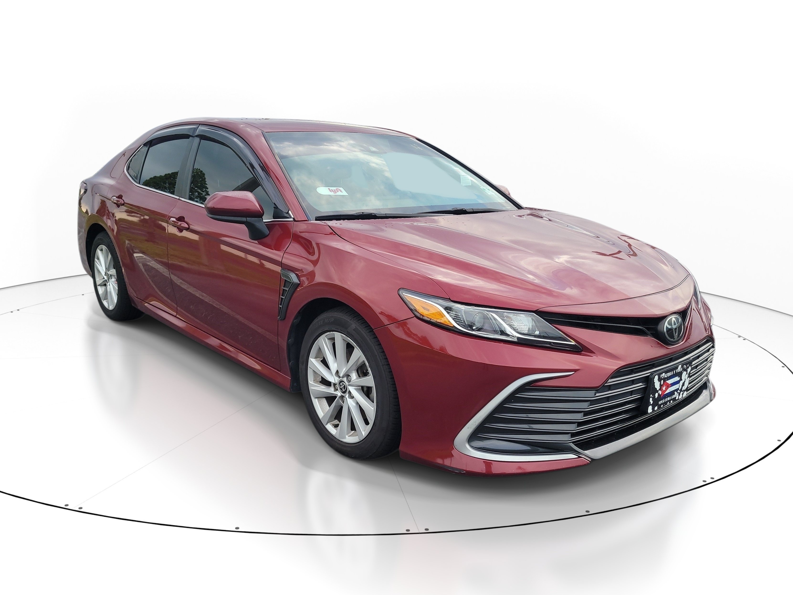 Used 2021 Pearl Toyota LE image 1