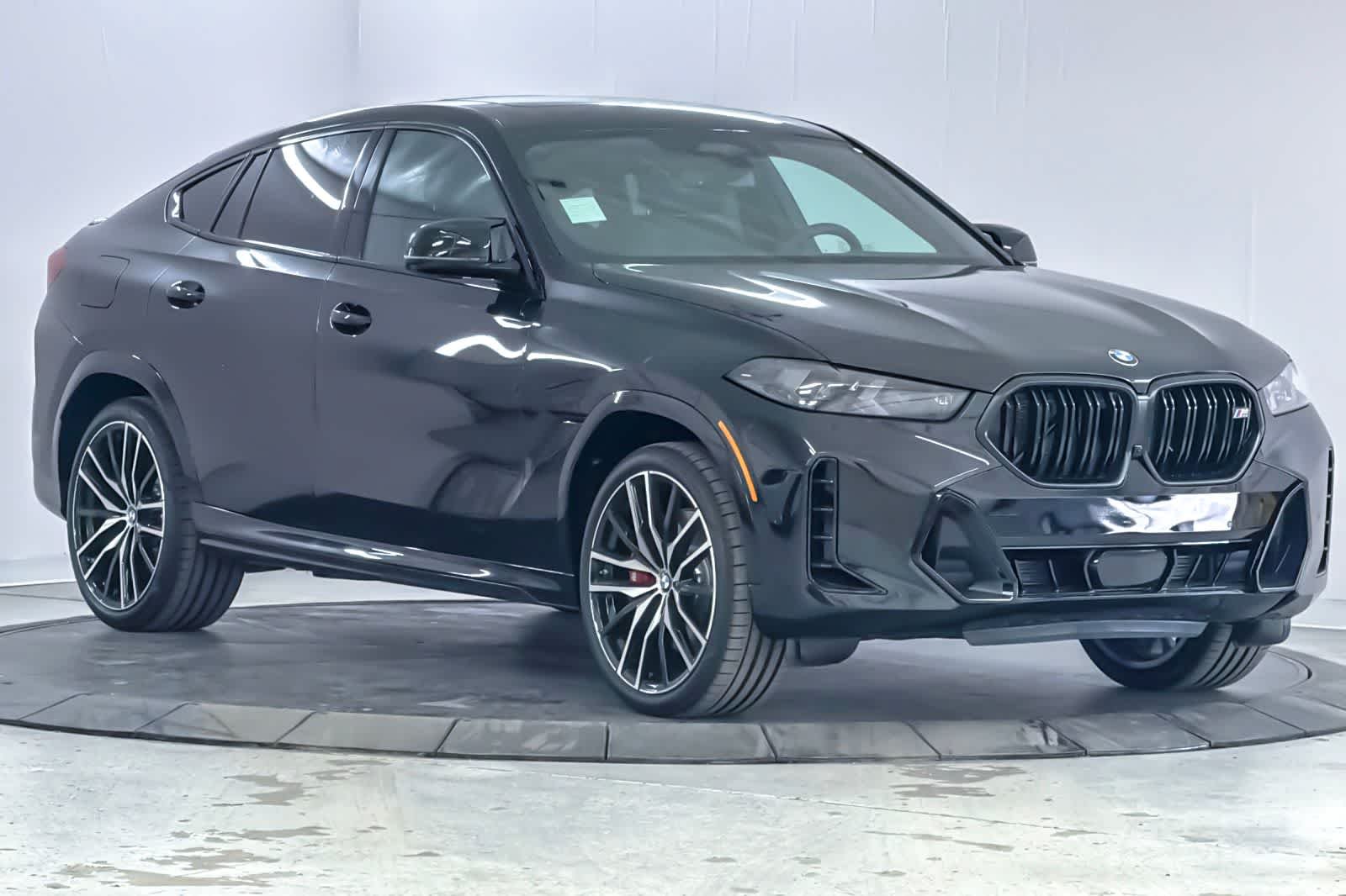 New 2026 Black Sapphire Metallic BMW M60i image 9