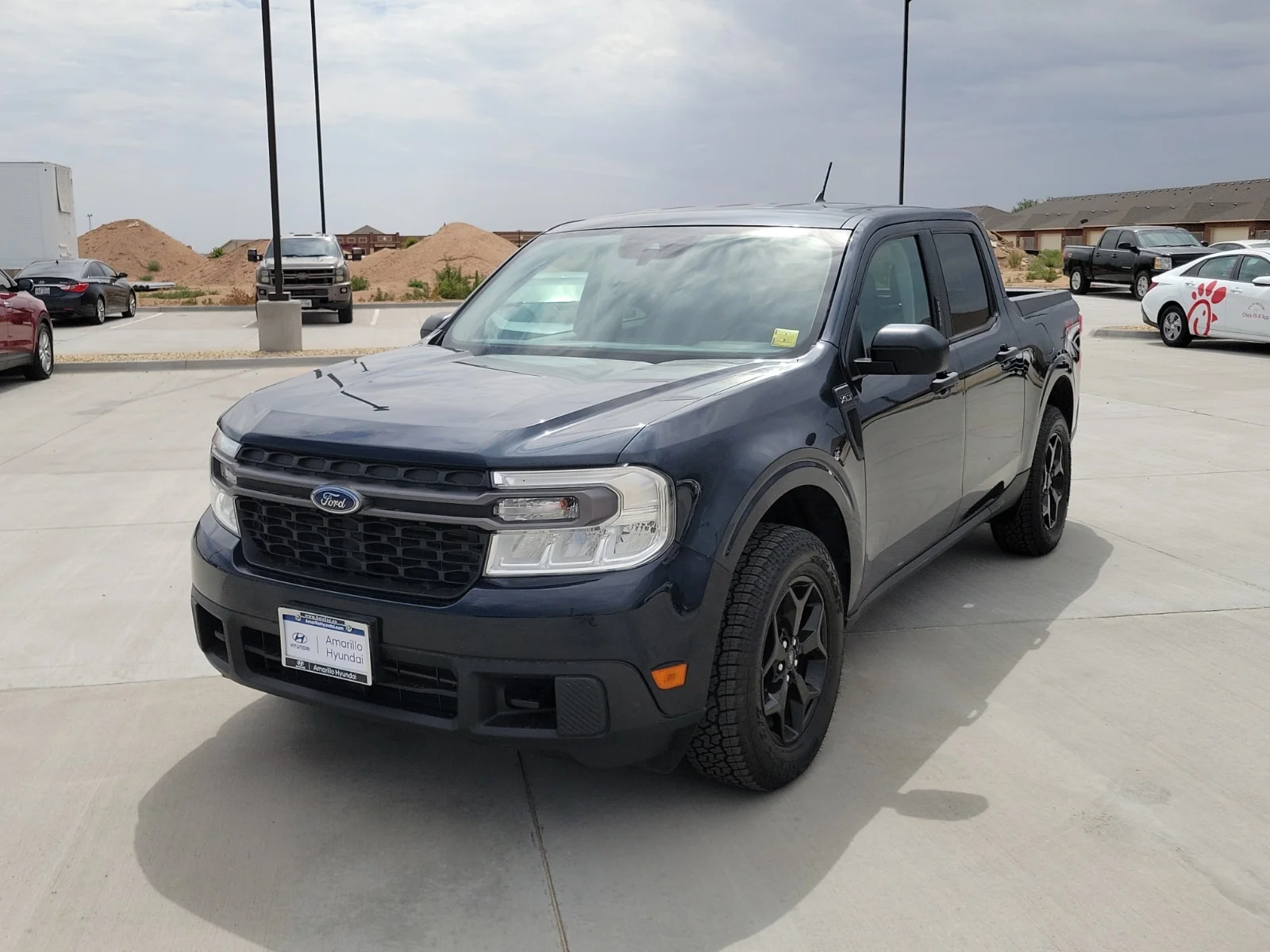 Used 2022 Blue Ford XLT All-Wheel Drive Supercrew 4.5 ft. box 121.1 in image 1