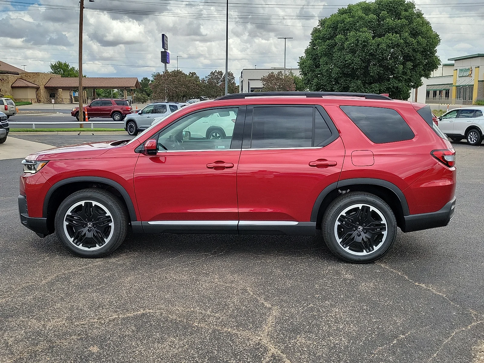 New 2026 Radiant Red Metallic II Honda Touring image 6