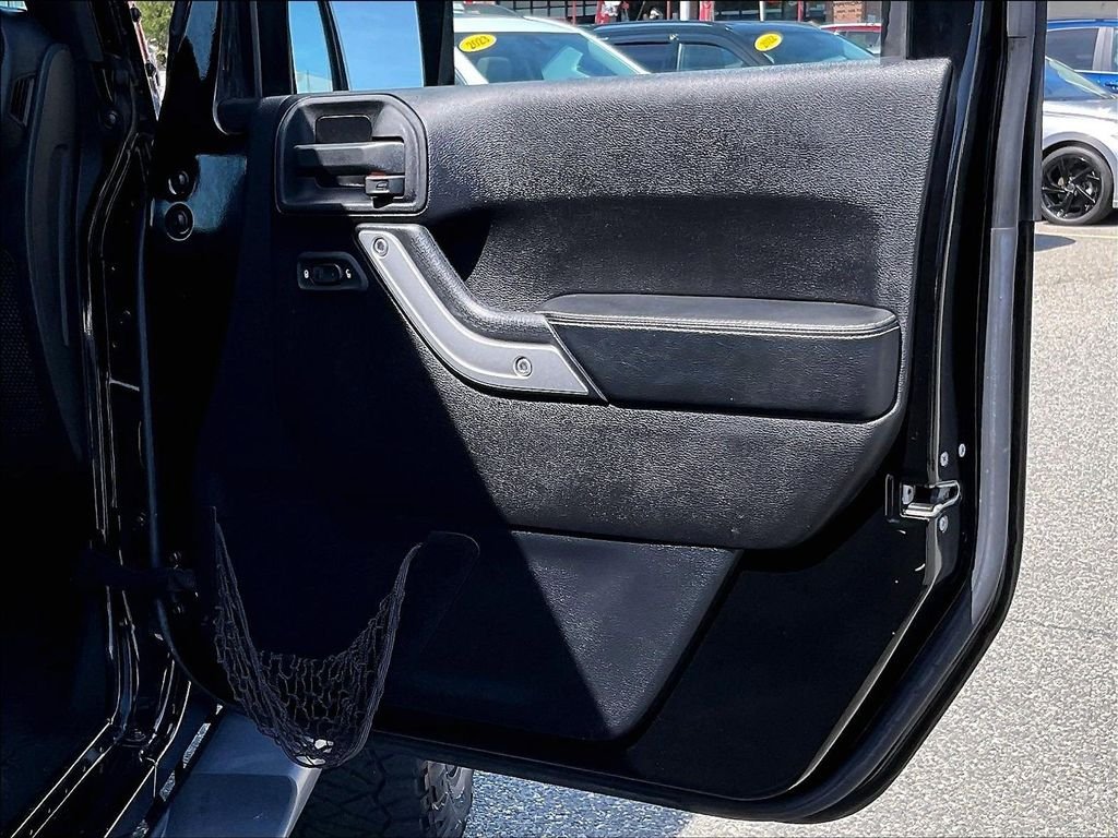 Used 2015 Black Jeep Unlimited Freedom Edition image 12