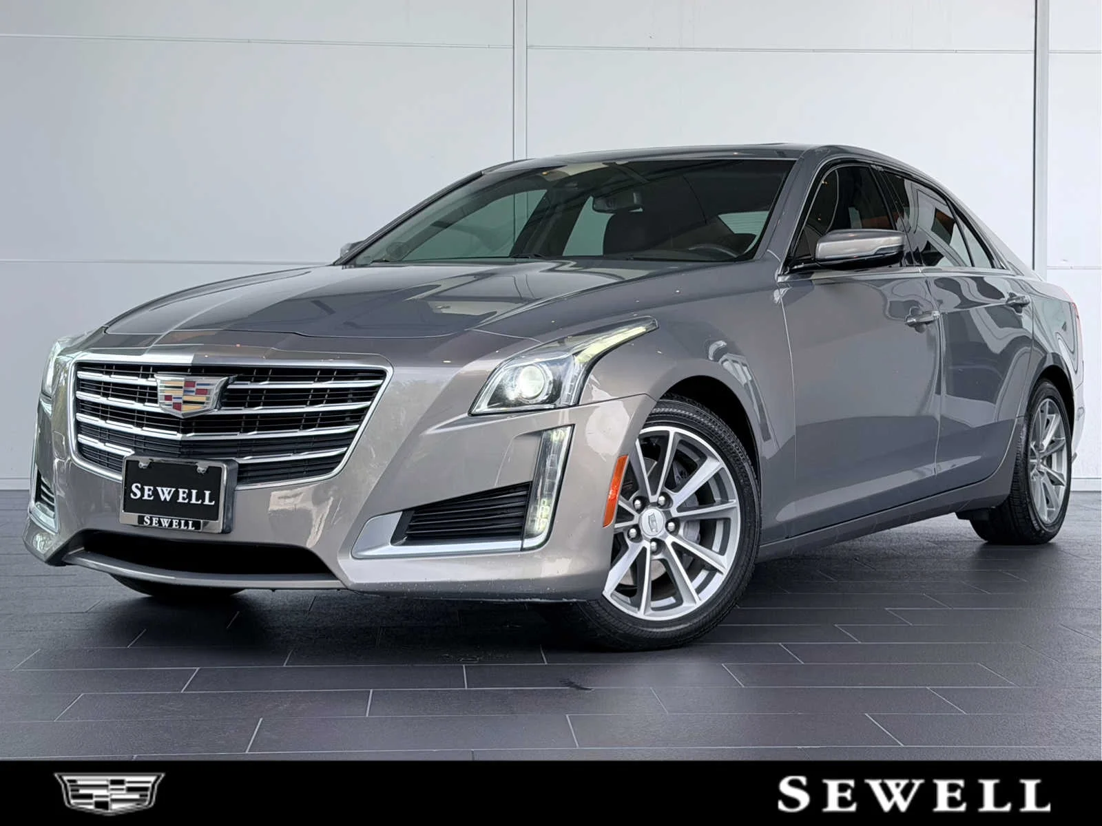 Used 2017 BRONZE DUNE METALLIC Cadillac Luxury RWD image 1
