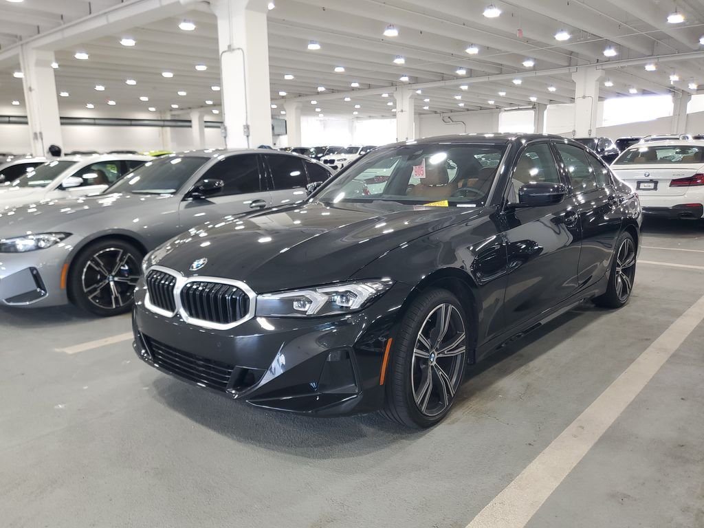 Certified Used 2023 Black Sapphire Metallic BMW 330i image 1