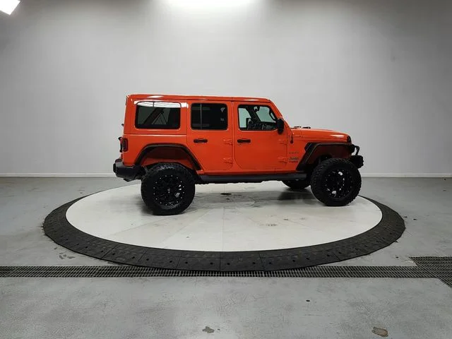 Used 2018 Orange Jeep Unlimited Sahara image 8
