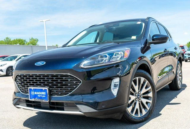 Used 2021 Blue Metallic Ford Titanium image 1