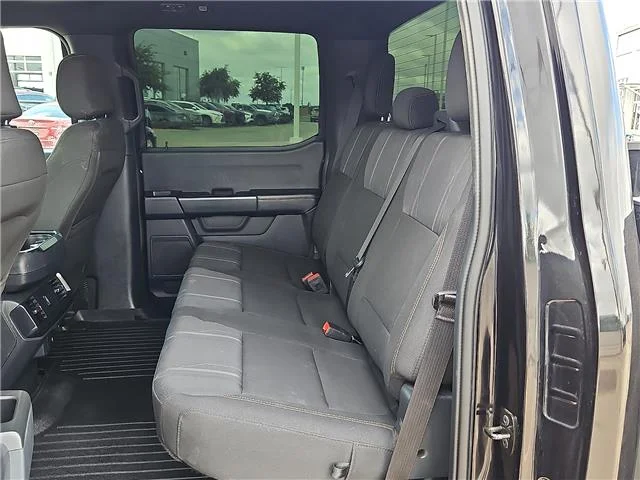 Used 2024 Agate Black Metallic Ford STX 4x4 SuperCrew Cab 5.5 ft. box 145 in. WB image 9