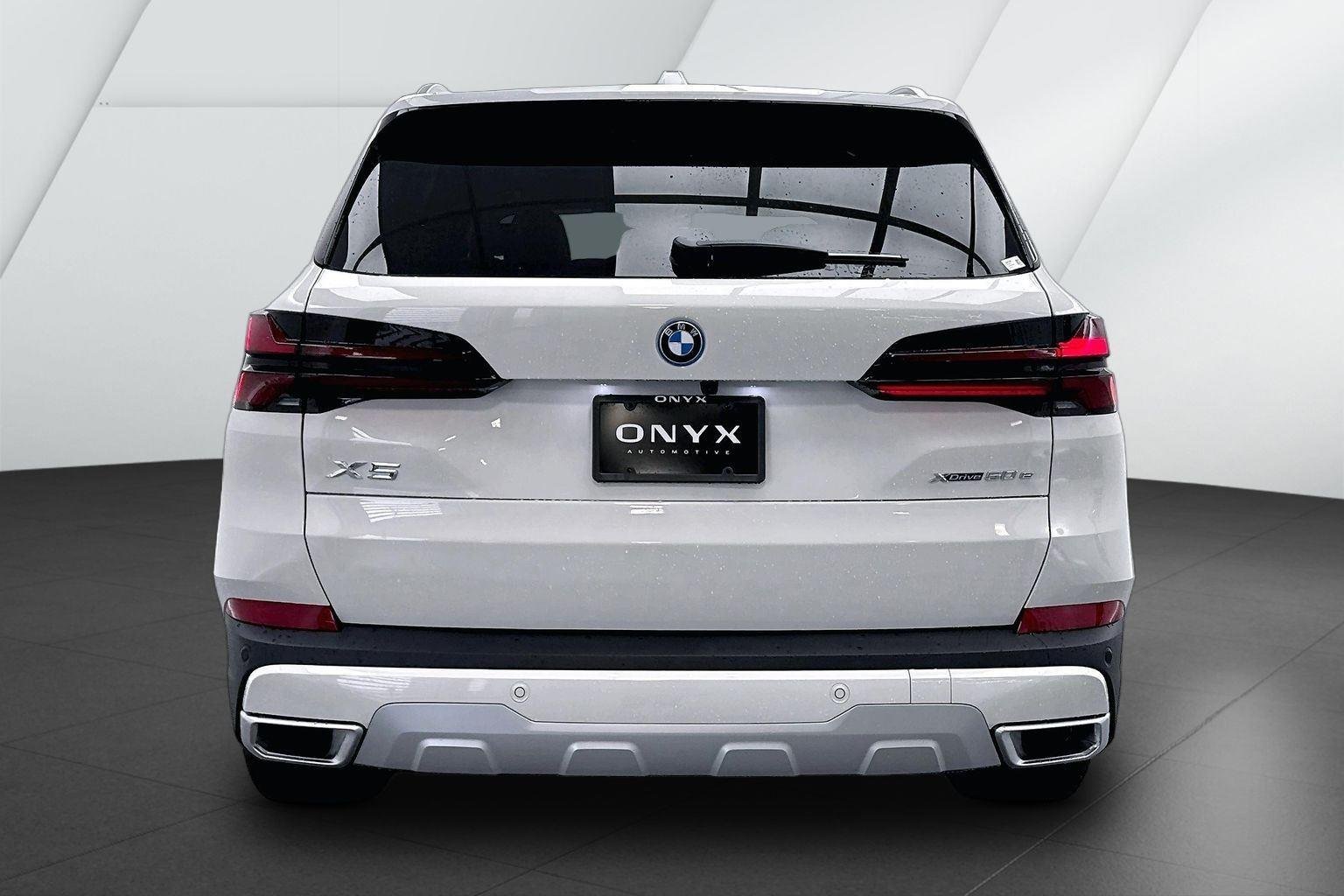 New 2026 Alpine White BMW xDrive50e image 3