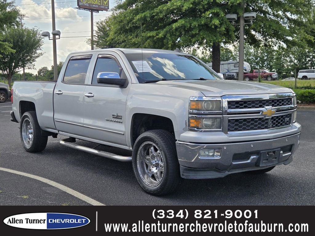Used 2014 SILVER ICE METALLIC Chevrolet LTZ image 1