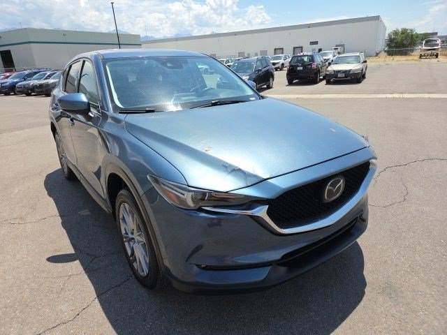Used 2019 Eternal Blue Mica Mazda Grand Touring image 1