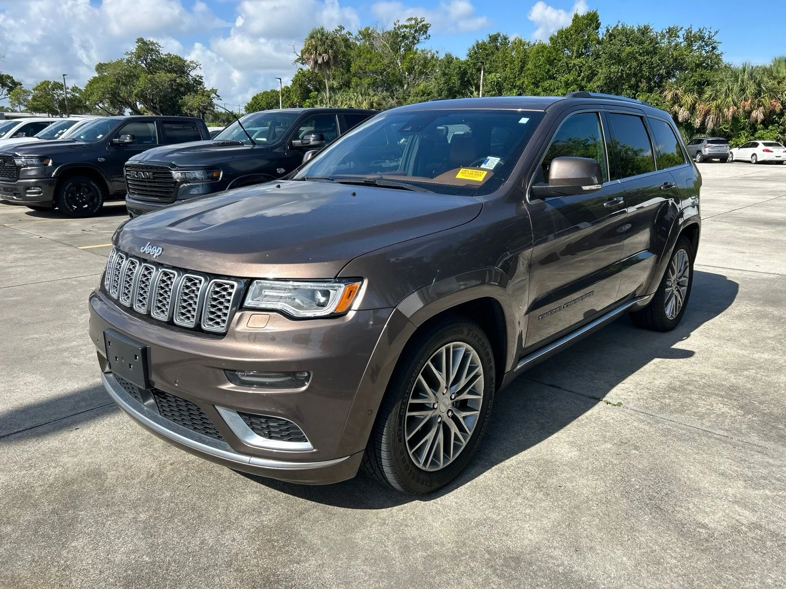 Used 2018 Brown Metallic Jeep Summit image 1