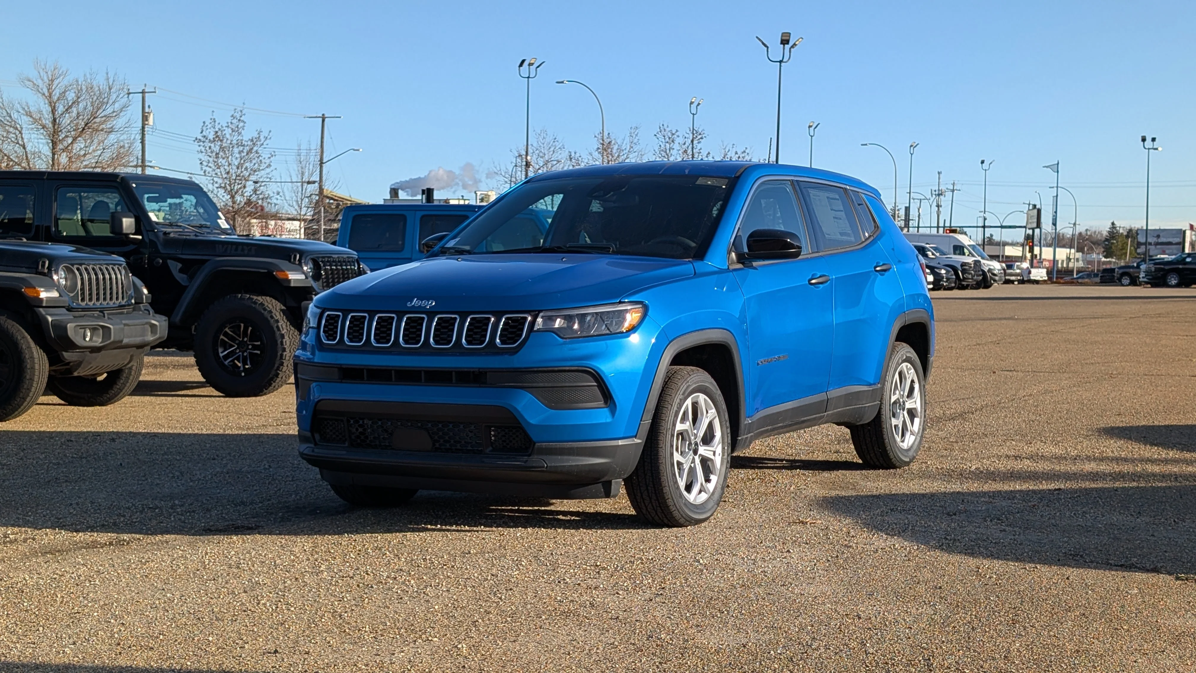 New 2026 Laser Blue Pearl Jeep Sport image 2