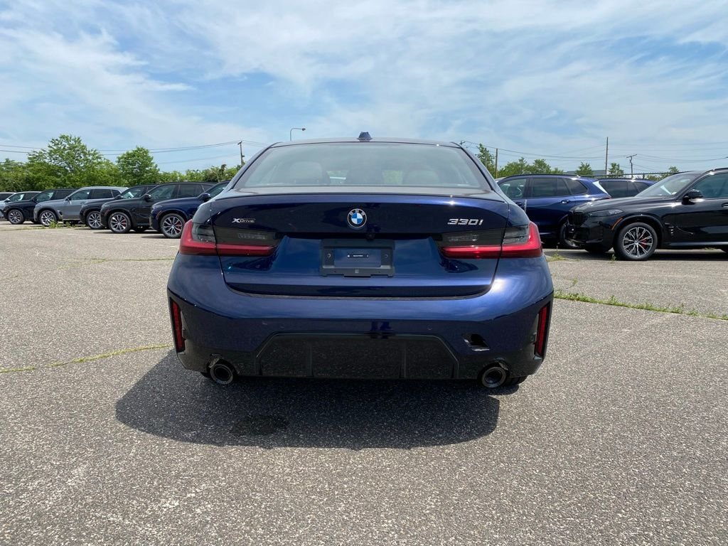 New 2026 Tanzanite Blue II Metallic BMW 330i xDrive image 3