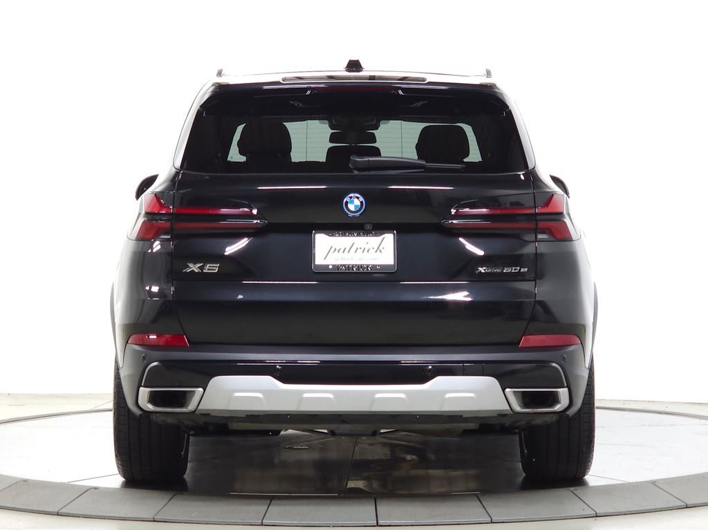Used 2026 Black Sapphire Metallic BMW xDrive50e image 6