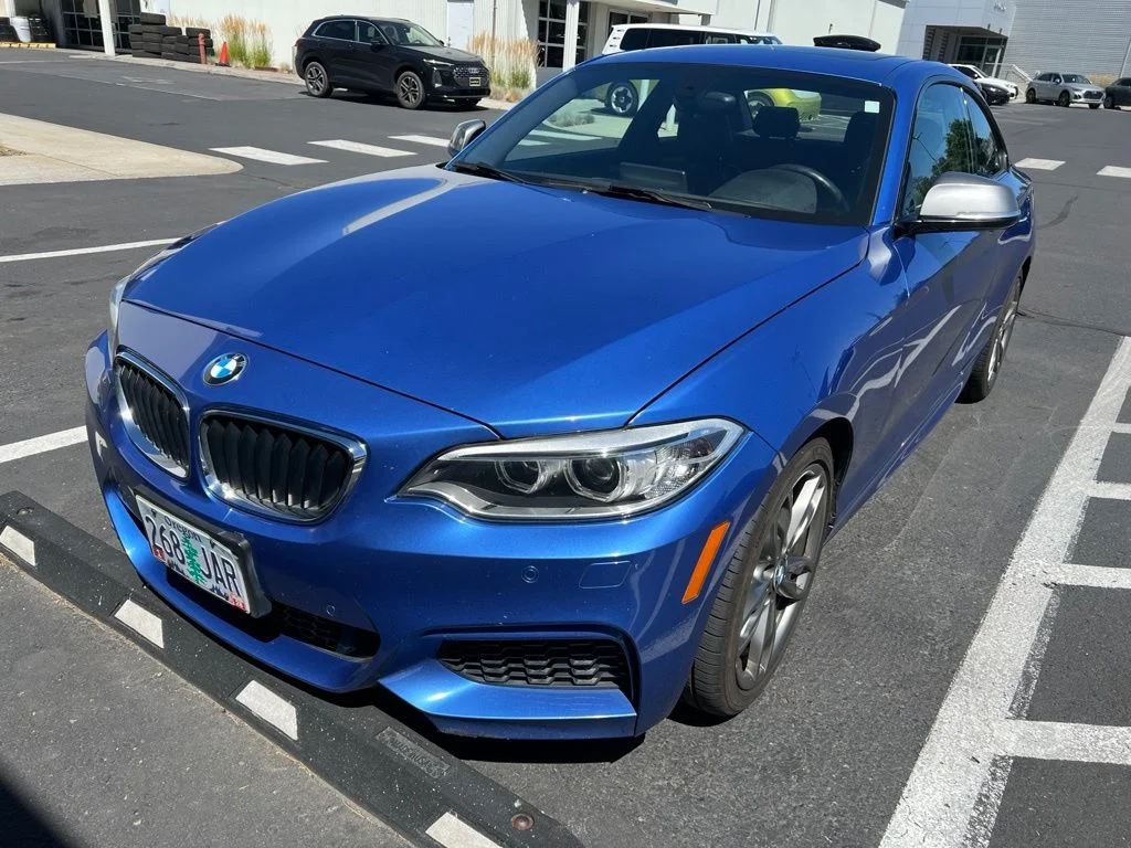 Used 2016 Blue BMW M235i xDrive image 1
