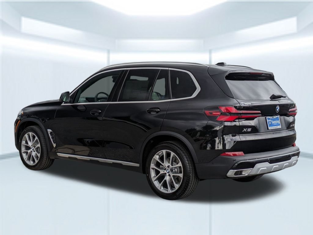 New 2026 Black Sapphire Metallic BMW sDrive40i image 3