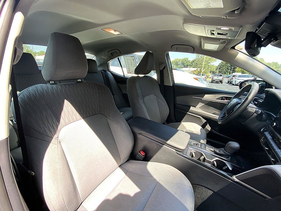 Used 2025 Midnight Black Metallic Toyota LE image 24