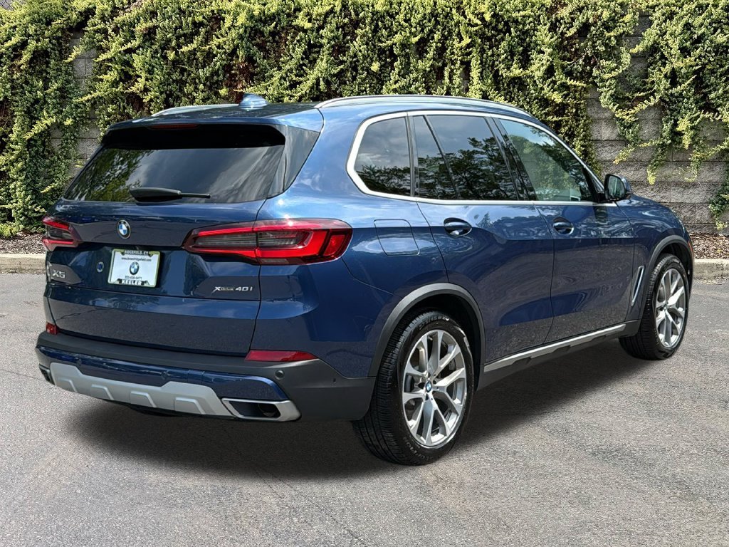 Used 2021 Phytonic Blue Metallic BMW xDrive40i image 4