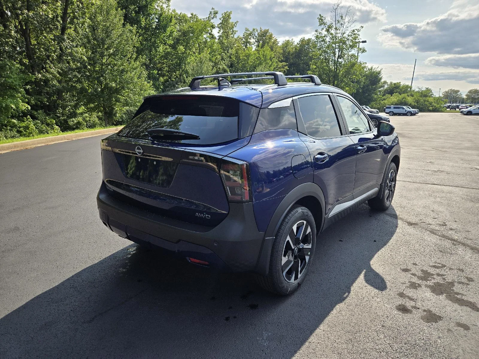 New 2026 Deep Blue Pearl Nissan SV image 3