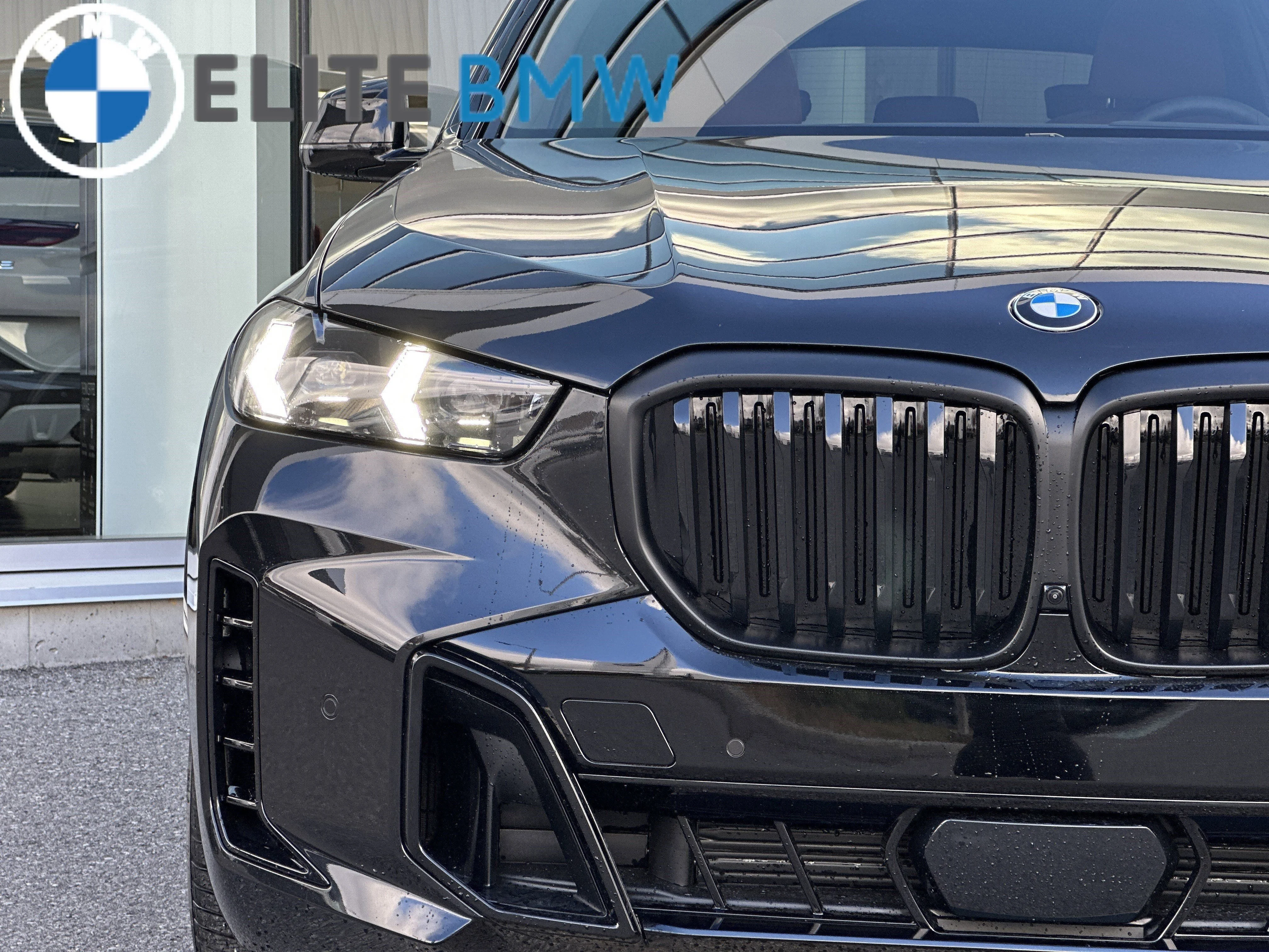 Used 2026 BLACK SAPPHIRE METALLIC BMW XDRIVE40I image 31
