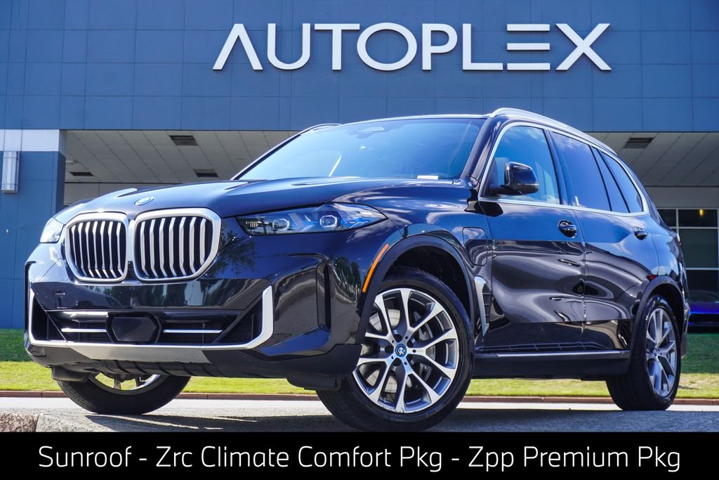 Used 2025 Black BMW xDrive50e image 1