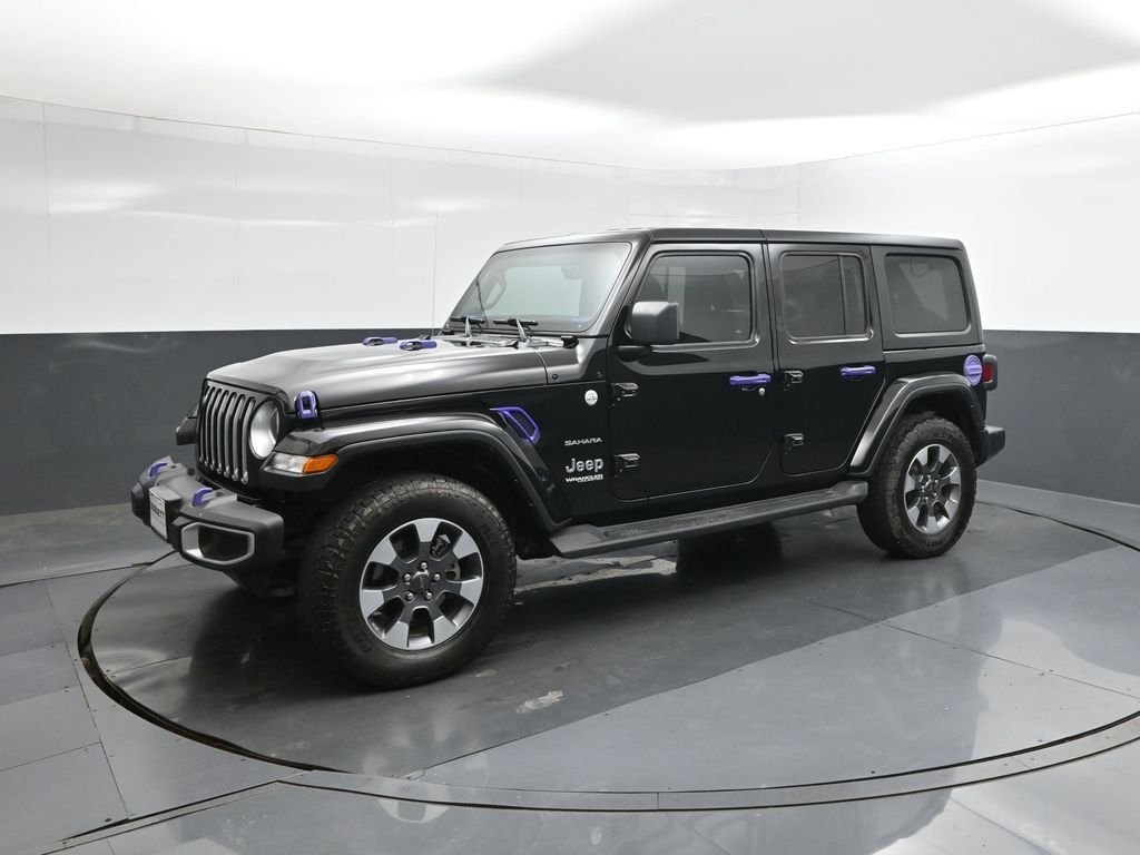 Used 2022 Black Jeep Unlimited Sahara image 1