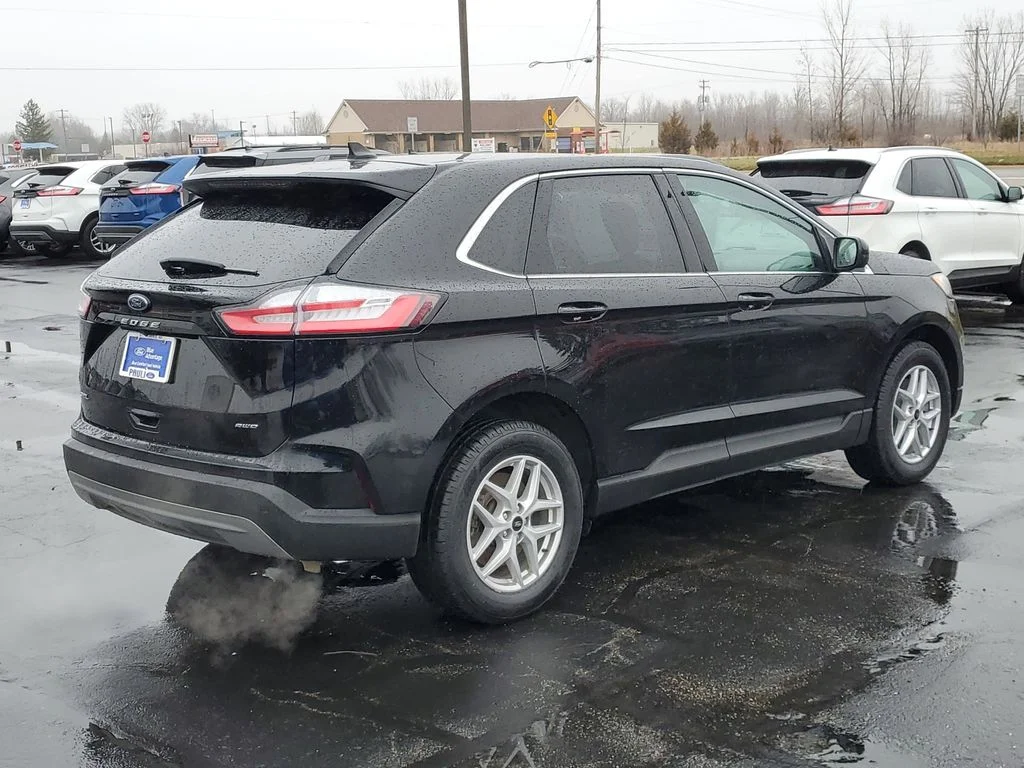Certified Used 2023 Agate Black Metallic Ford SEL image 4