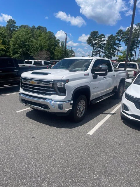 Used 2024 Summit White Chevrolet LTZ image 1