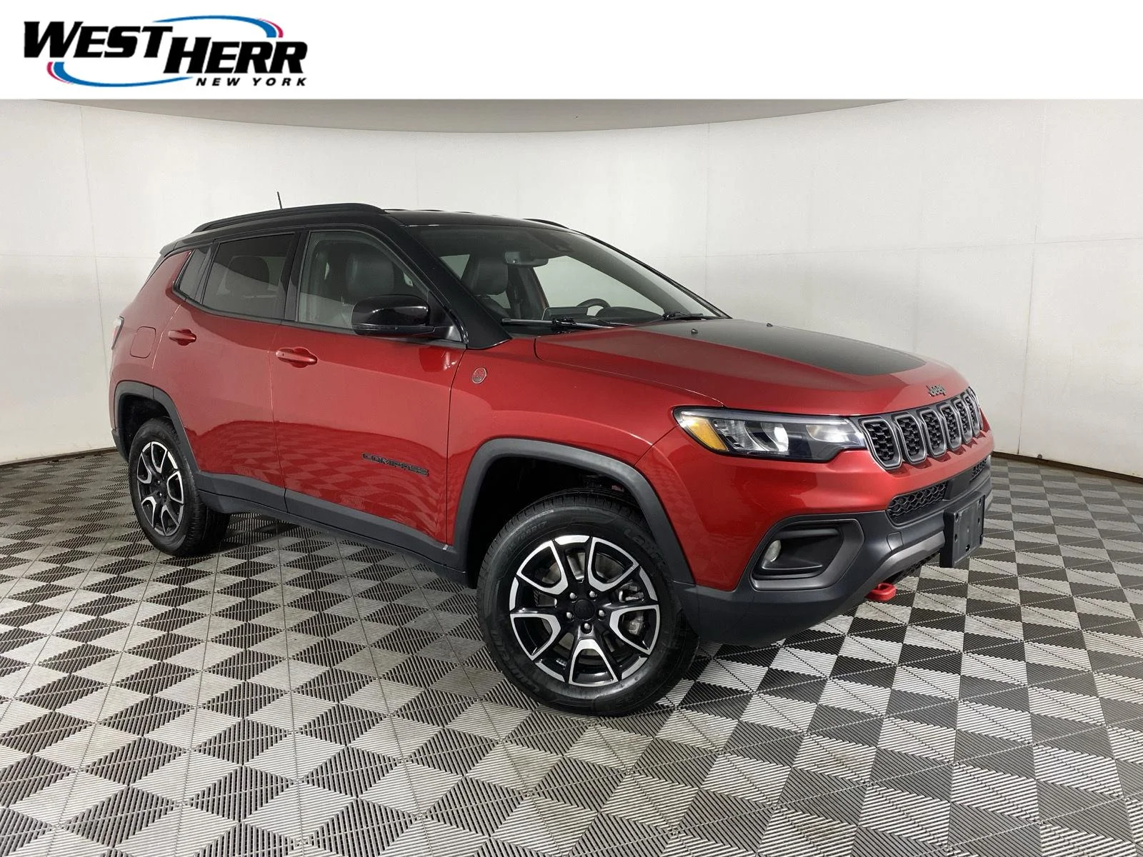 Used 2024 Red Hot Pearlcoat Jeep Trailhawk image 1