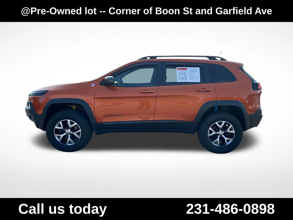 Used 2015 Orange Jeep Trailhawk image 2