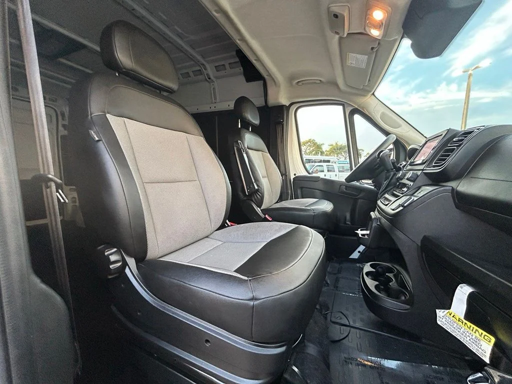 Used 2025 Bright White Clearcoat Ram High Roof image 25