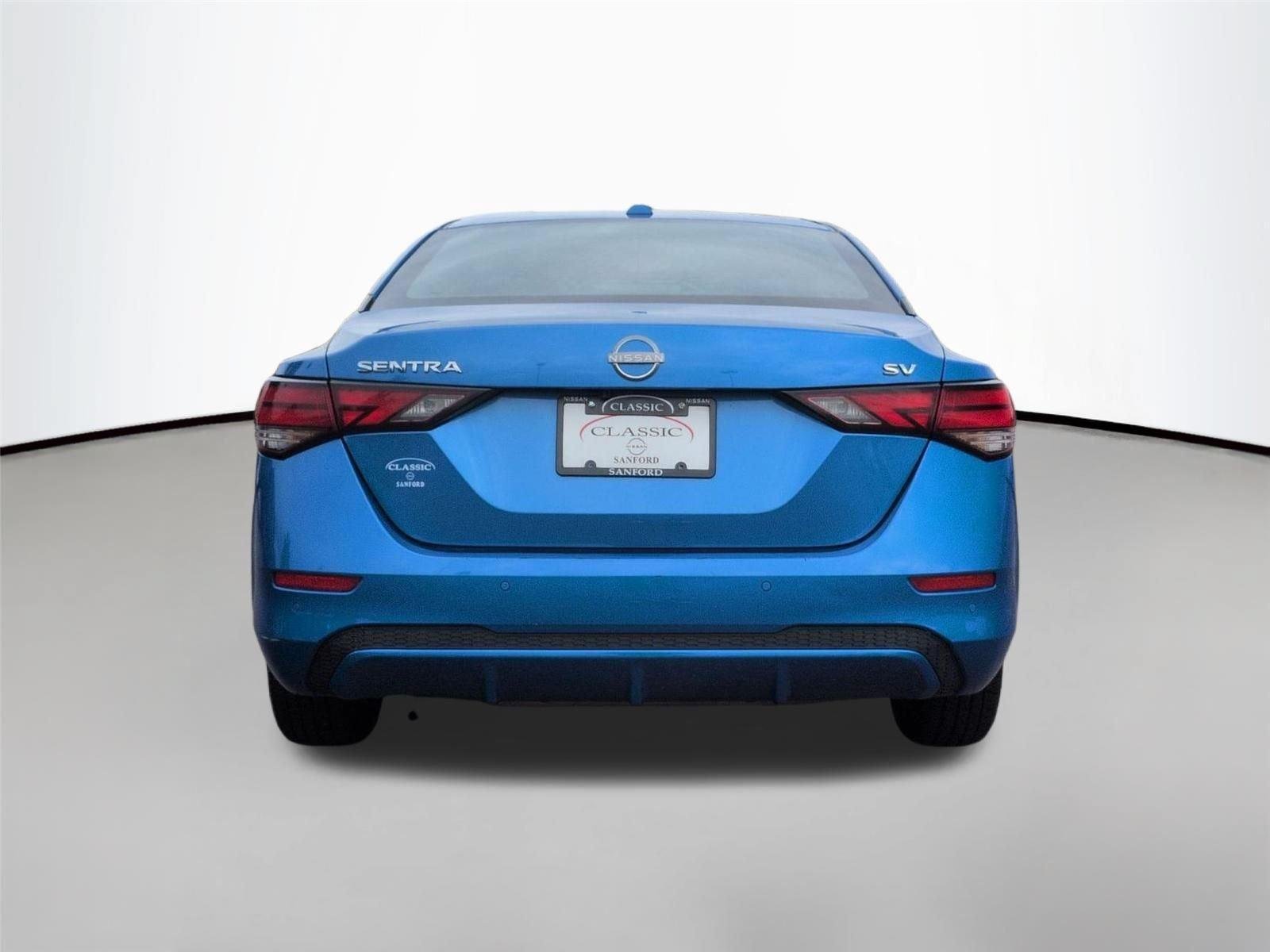 Used 2024 Electric Blue Metallic Nissan SV image 4