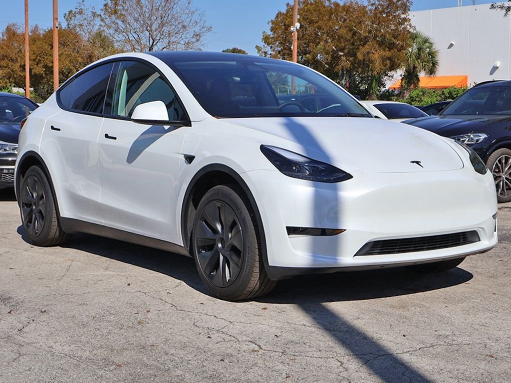 Used 2025 Tesla Model Y Long Range with VIN 7SAYGDED1SA378964 for sale in Miami, FL