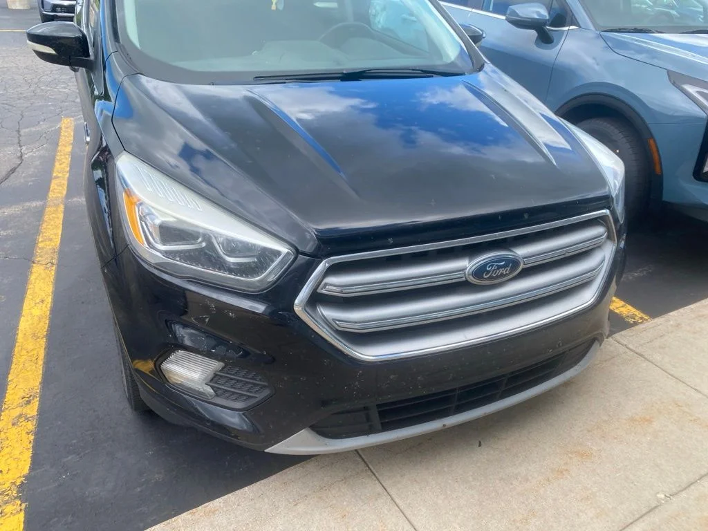Used 2017 Ford Escape Titanium with VIN 1FMCU0JD5HUA31814 for sale in Traverse City, MI