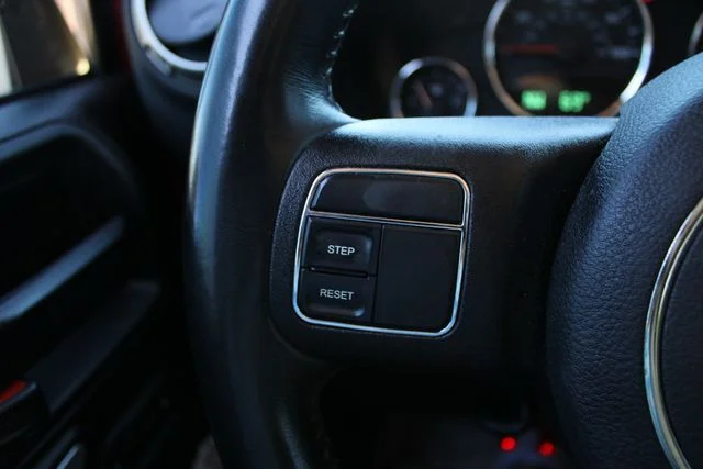 Used 2018 Red Jeep Unlimited Sahara image 5