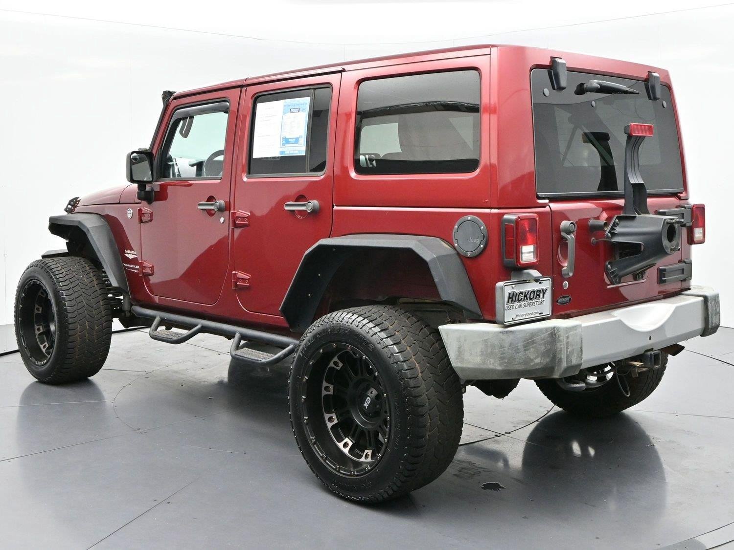 Used 2011 Deep Cherry Red Crystal Pearlcoat Jeep Sahara image 5