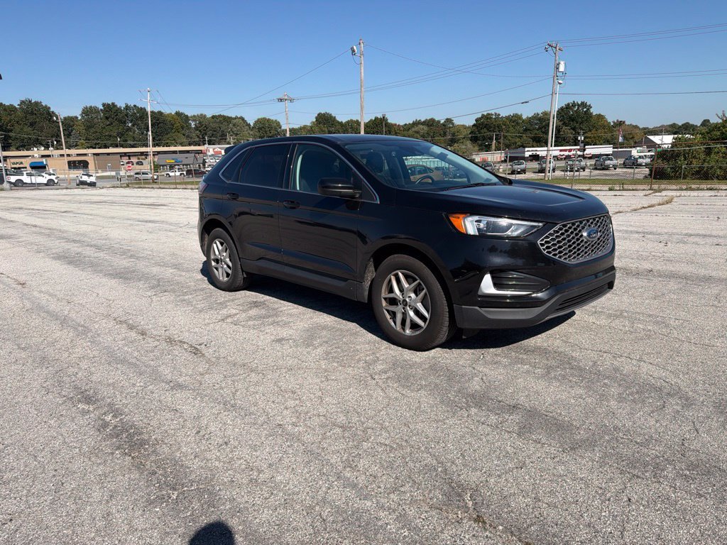 Used 2024 Black Metallic Ford SEL image 1