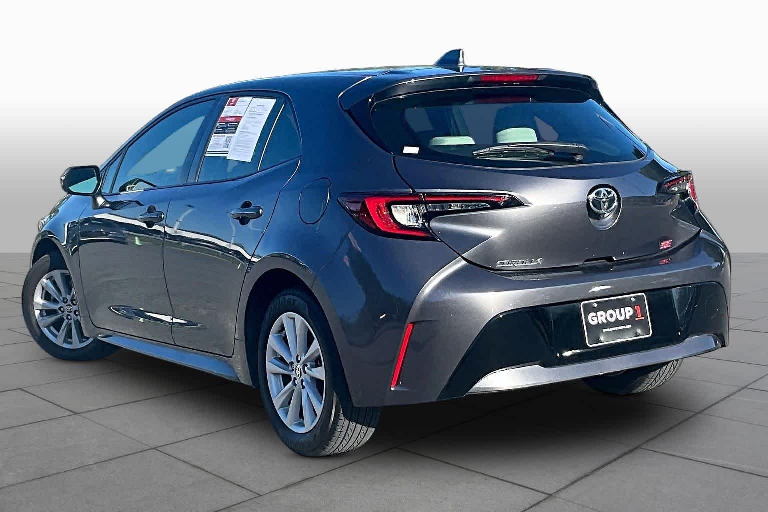 Used 2023 Magnetic Gray Metallic Toyota SE image 12