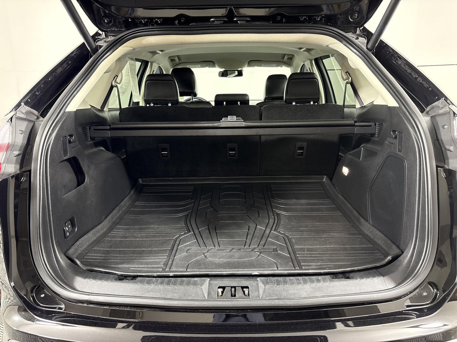 Used 2024 Agate Black Metallic Ford Titanium image 19