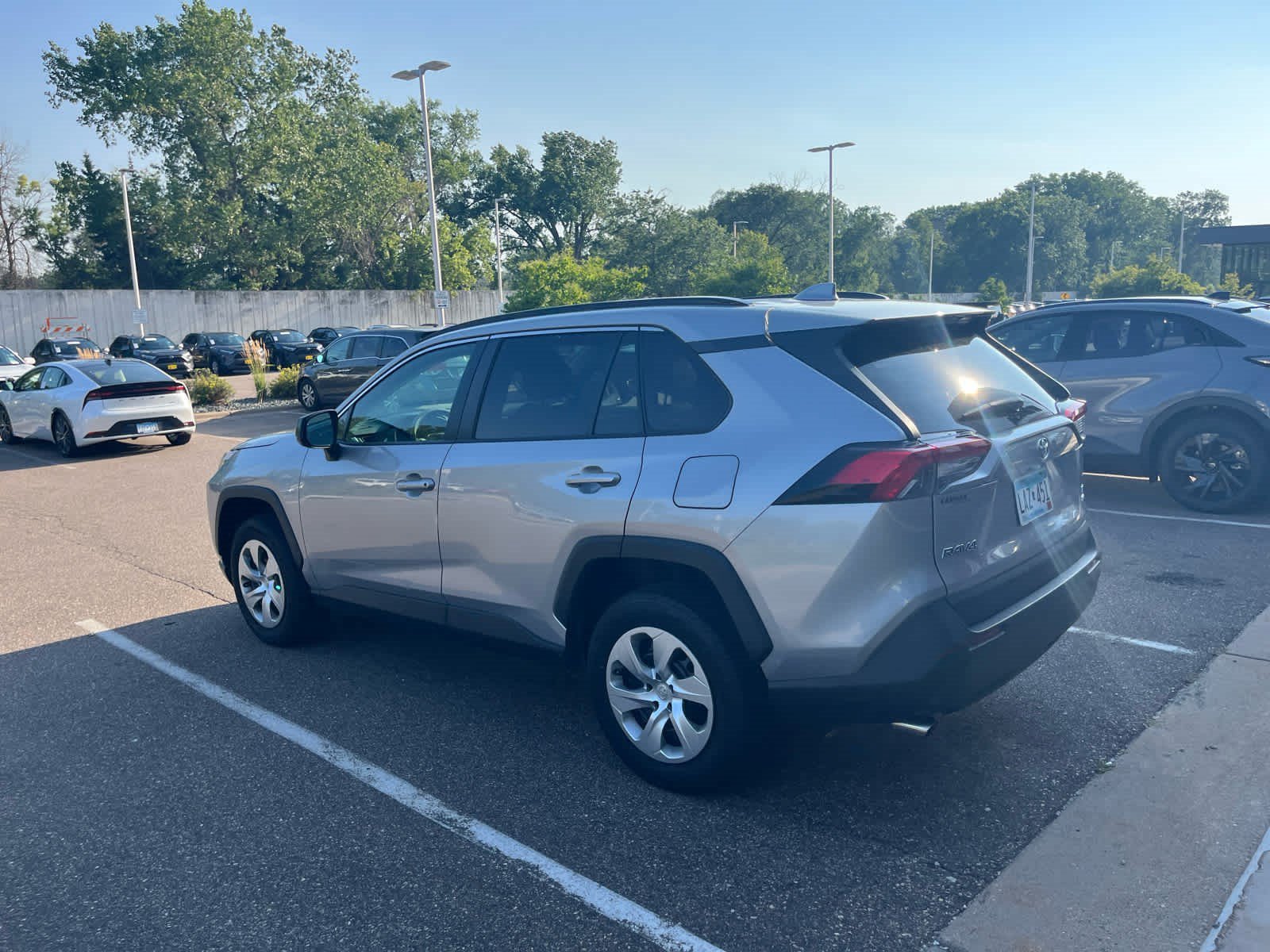Used 2019 Silver Sky Metallic Toyota LE image 4