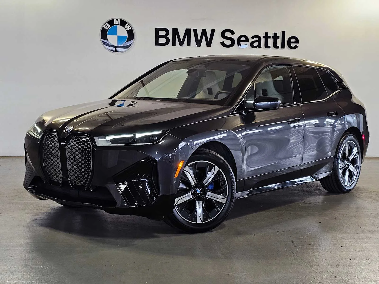 Certified Used 2024 Dark Graphite Metallic BMW xDrive50 image 1