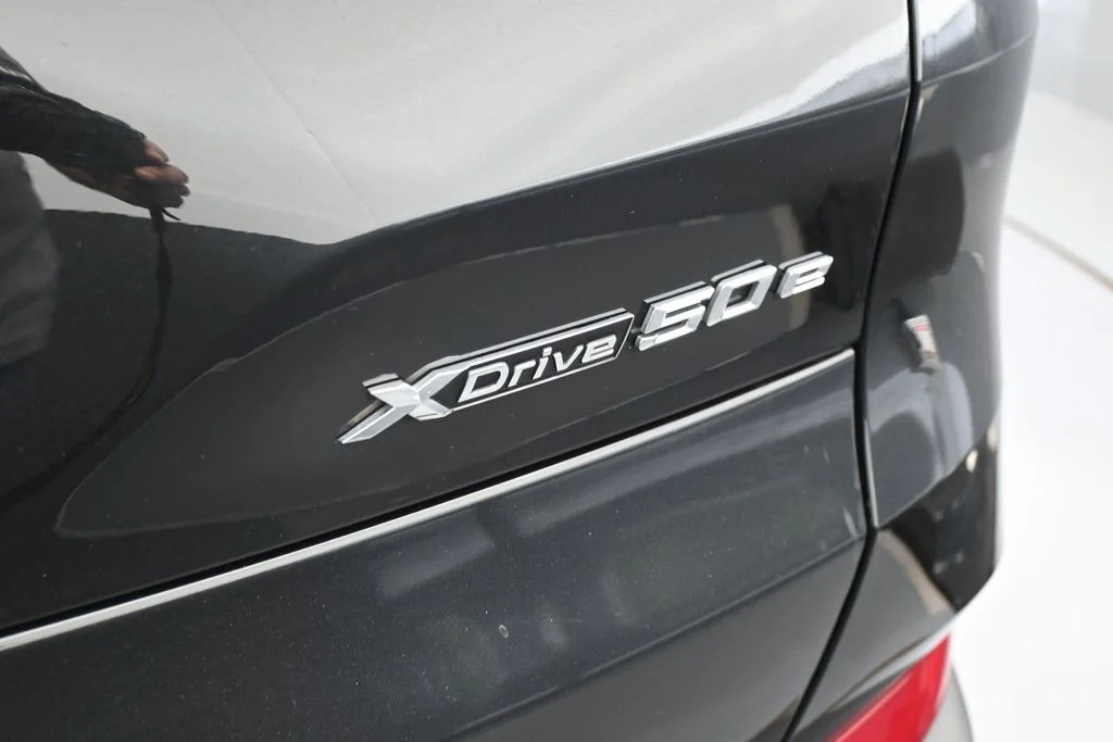 Used 2025 Black Sapphire Metallic BMW xDrive50e image 43