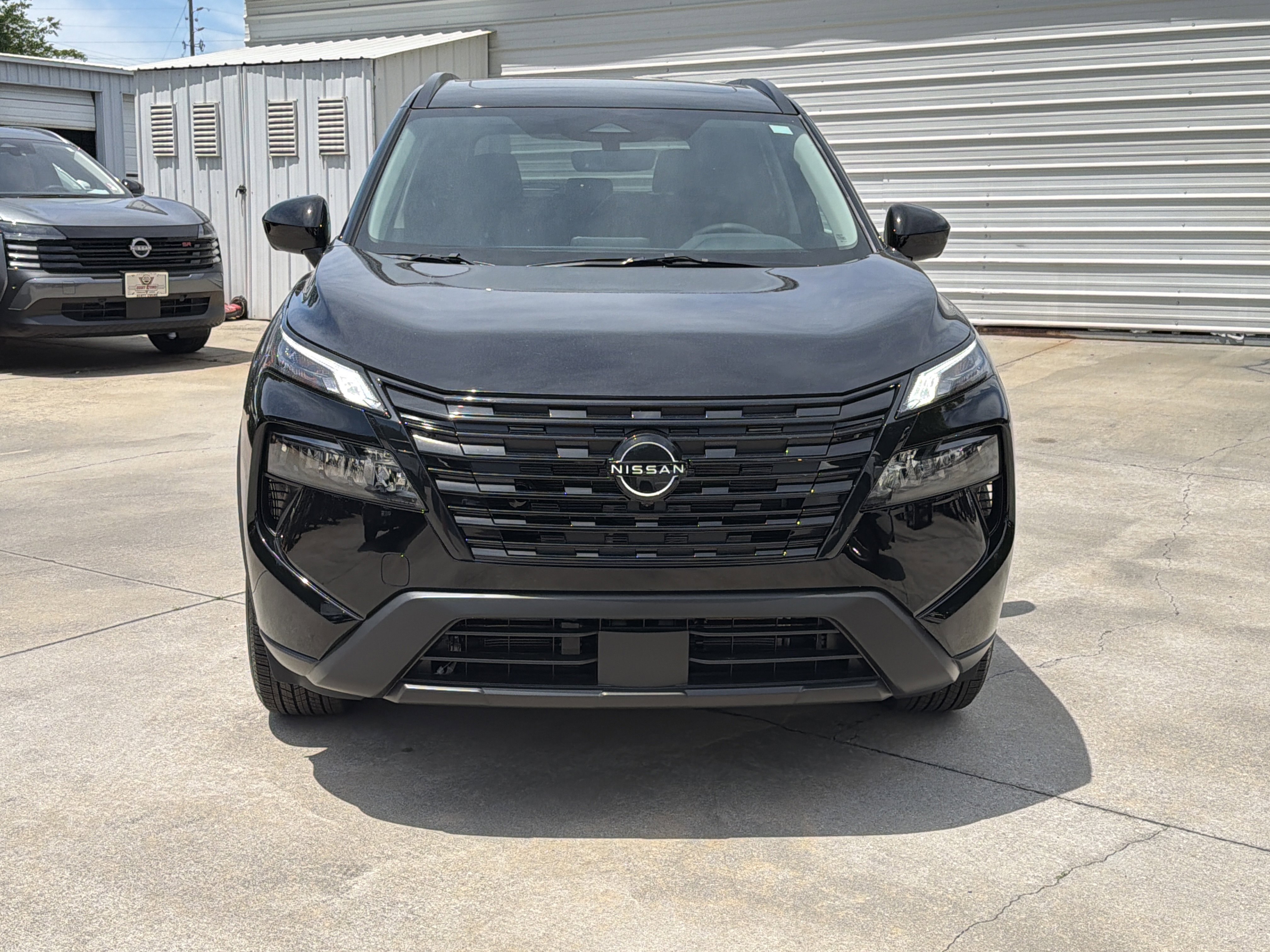 New 2026 Super Black Nissan Dark Armor image 3