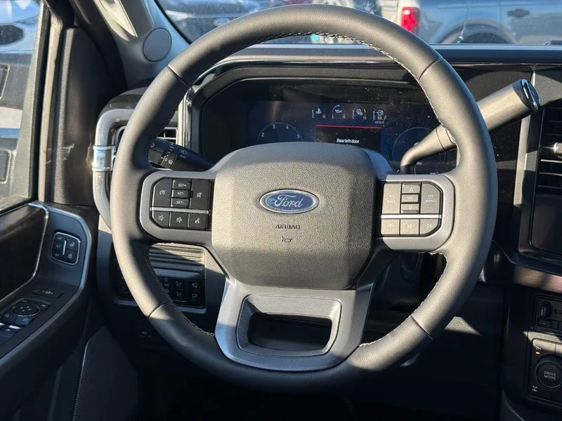 New 2026 Oxford White Ford LARIAT 4WD Crew Cab 6.75
