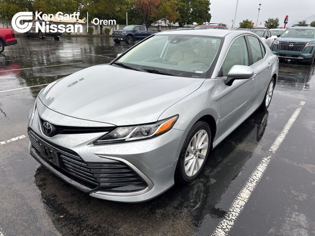 Used 2021 Celestial Silver Metallic Toyota LE image 1