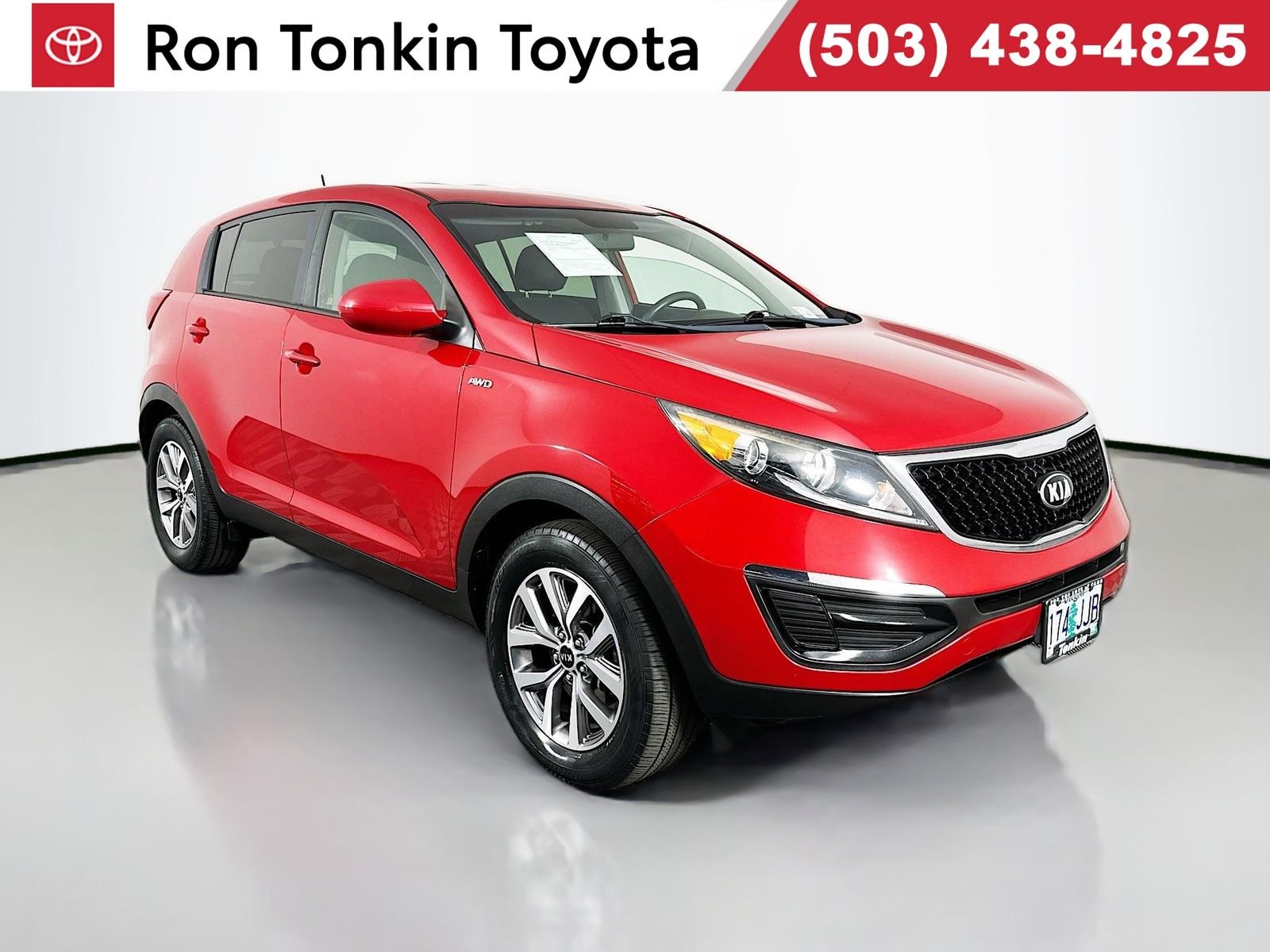Used 2014 Signal Red Kia LX image 1
