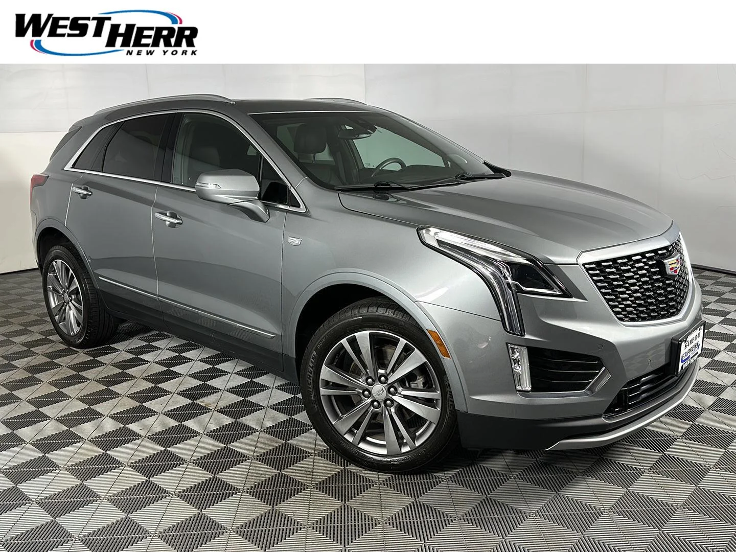 Used 2024 Argent Silver Metallic Cadillac AWD Premium Luxury image 1