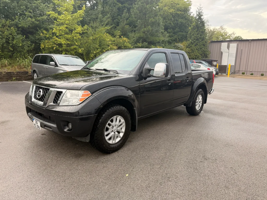 Certified Used 2019 Magnetic Black Pearl Nissan SV image 1