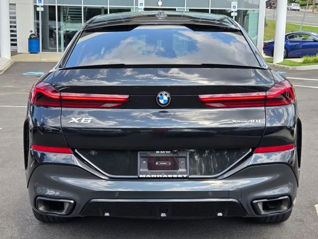 Certified Used 2024 Black Sapphire Metallic BMW xDrive40i image 6