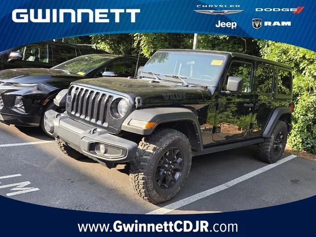 Used 2022 Black Jeep Unlimited Willys image 1